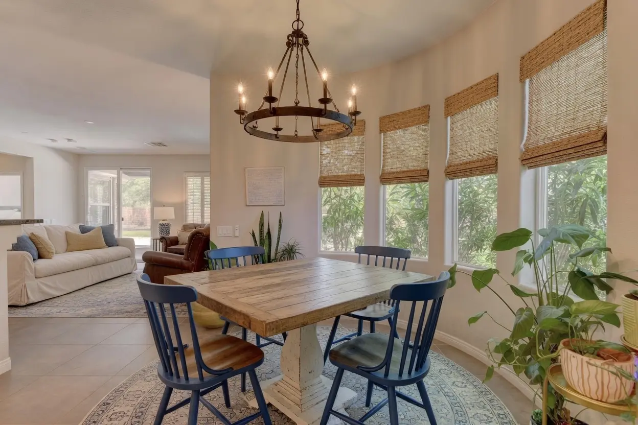 Elements natural woven shades adding warm texture to a Las Vegas dining room