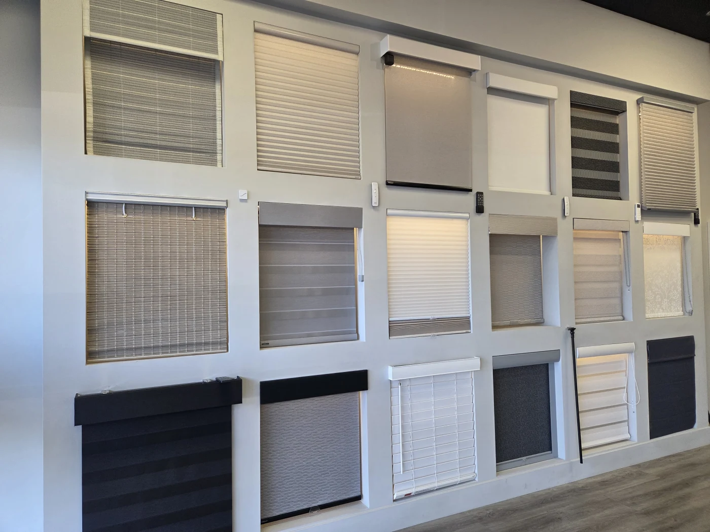 Motorized shade, drapery, and window covering samples in the Henderson showroom